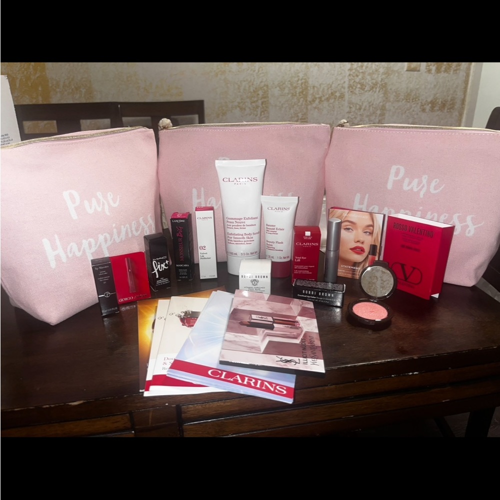 clarins bag with mixed items